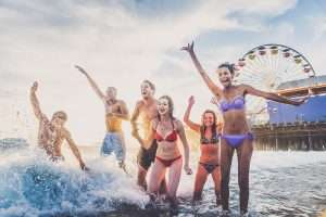 Friends playing in the ocean