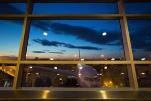 A view of an plane through a terminal window