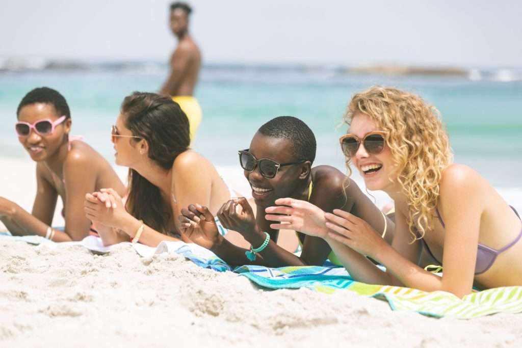 A group of people having fun on a beach