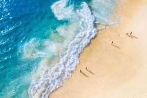 A sandy beach with vacationers
