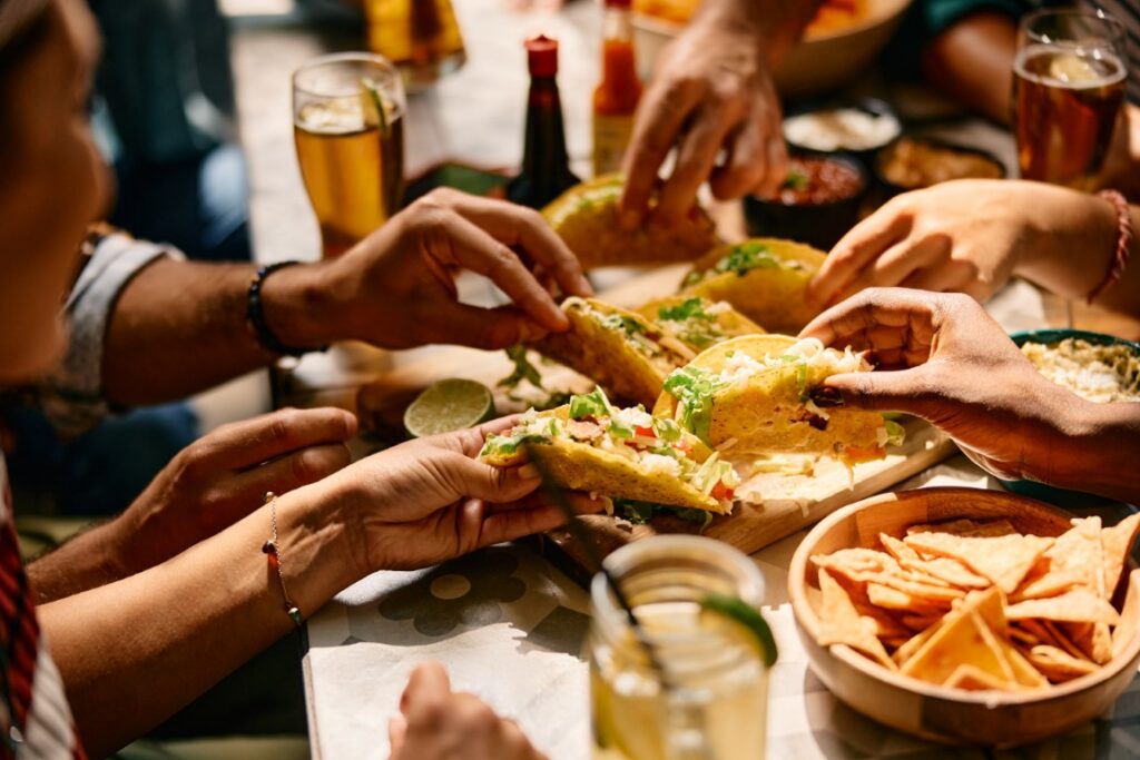 People enjoying Mexican food together